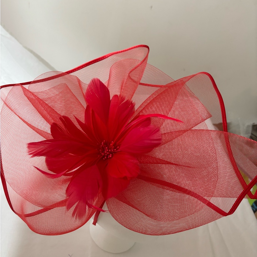 Dramatic Red Bow Hat with Sheer Fabric and Flower Design